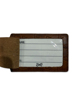 Lusso Texas Tech Shiloh luggage tag with the privacy flap open showing the clear ID window and name and phone card