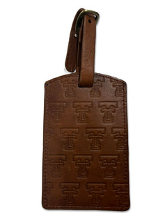 Lusso Texas Tech Shiloh brown leather luggage tag embossed with an all-over throwback Double T pattern and a buckled strap