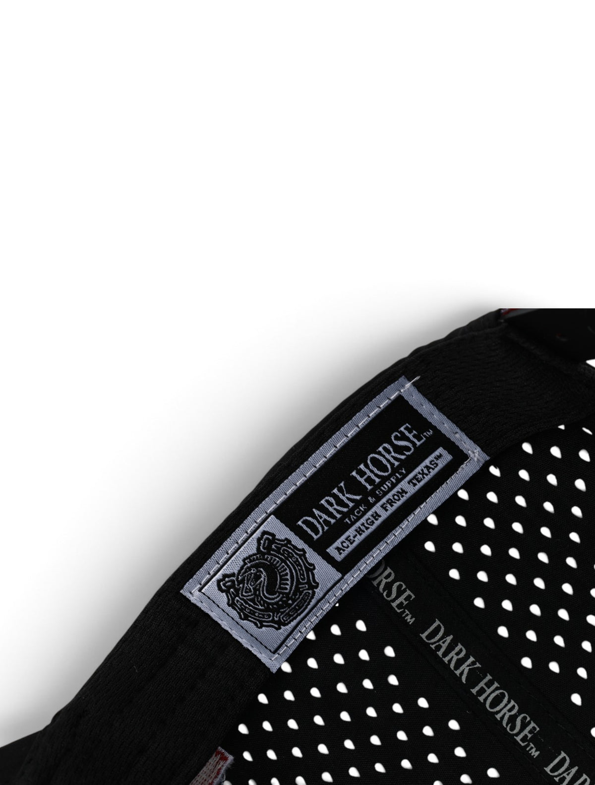 Close up of the laser cut venting and white rope detail on the Texas Tech Dark Horse black snapback cap