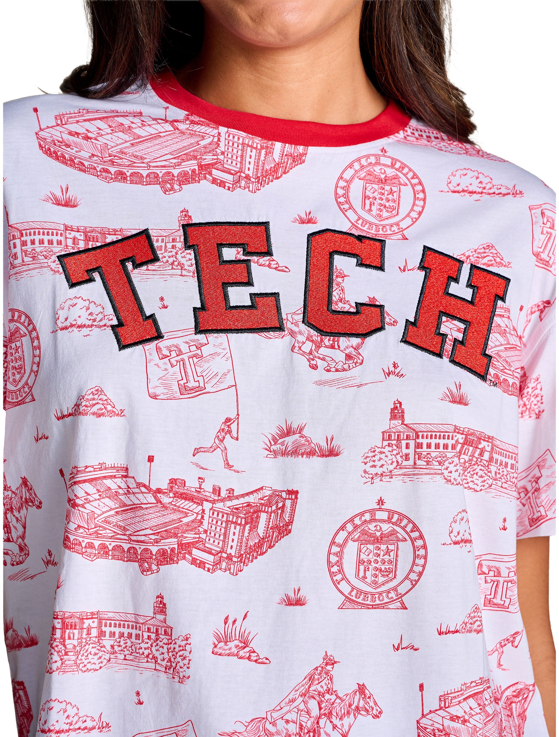 Close up of the red campus toile print and the embroidered TECH lettering with the red ringer collar