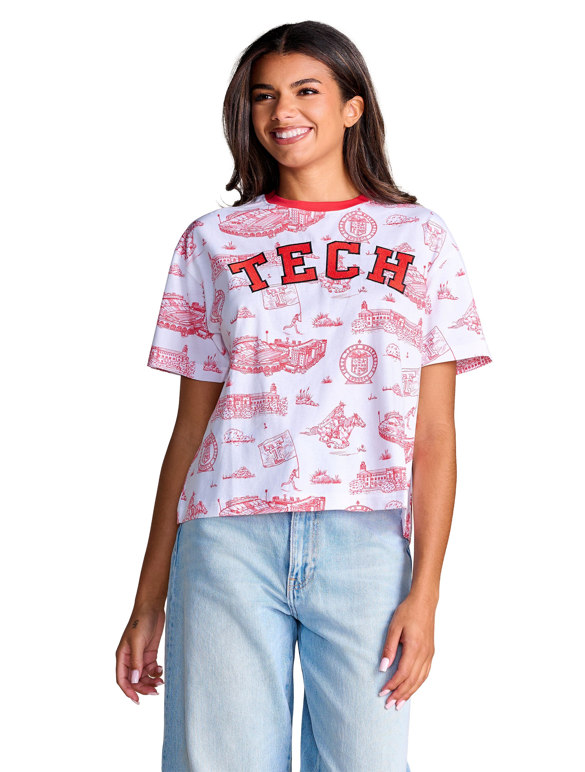 Model wearing the white Stewart Simmons Texas Tech tee with a red campus toile print and embroidered TECH across the chest