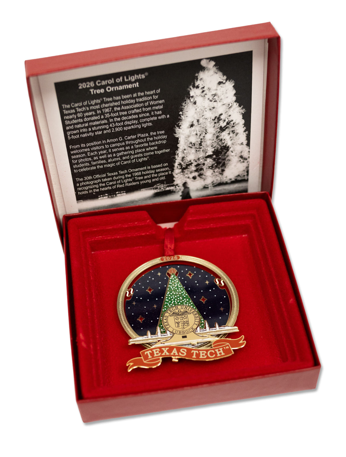 Texas Tech 2026 Carol of Lights ornament in its open red presentation box with the history card