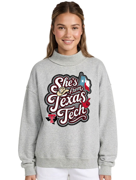 Texas Tech Red Raiders heather grey mock neck sweatshirt with a "She's from Texas Tech" rope-script graphic, cowboy hat, Texas flag, and Guns Up hand
