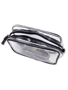 Top view of the clear crossbody purse unzipped, showing the single main compartment with both straps stored inside