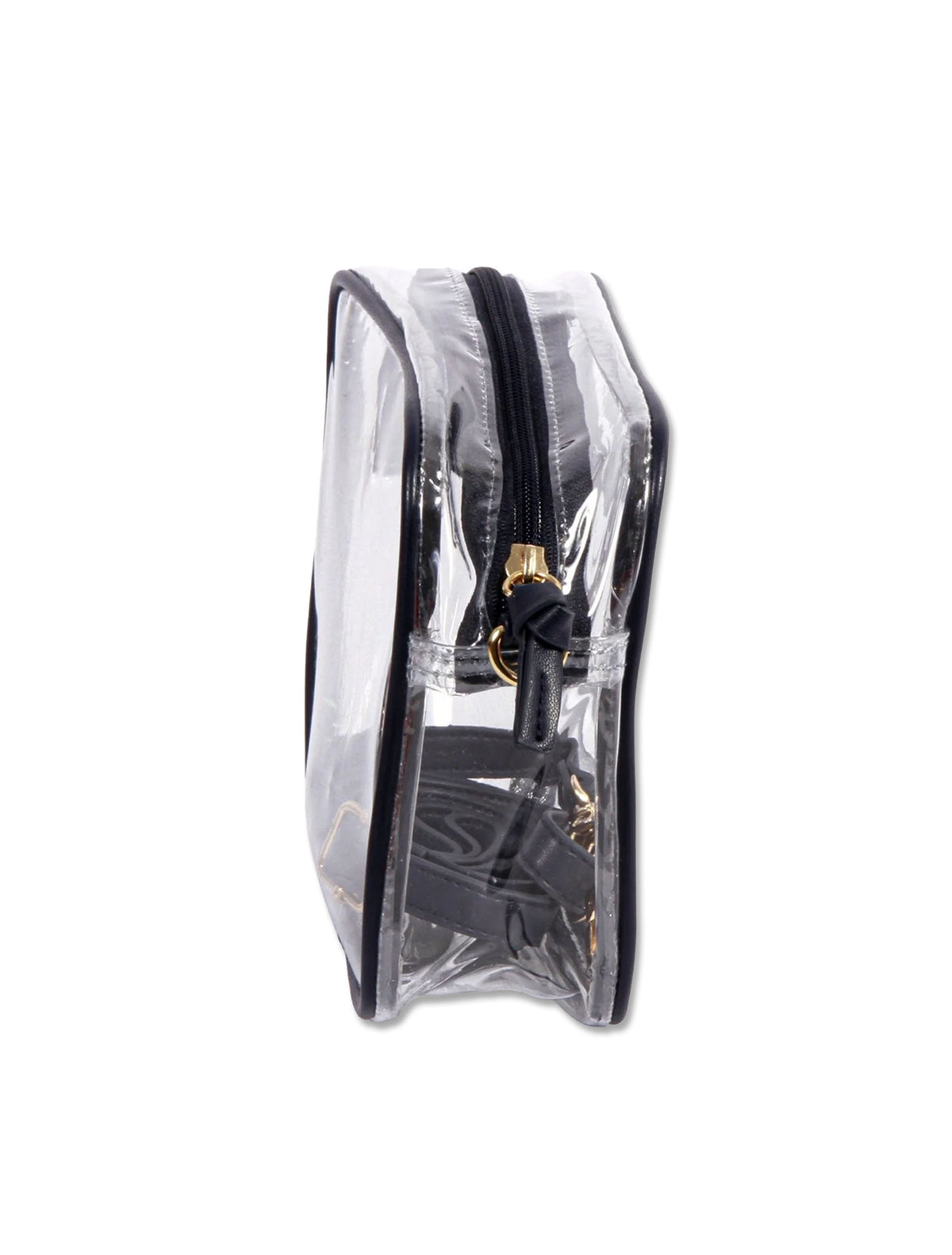 Side view of the clear crossbody purse showing its narrow depth and black zip top with a leather pull tab