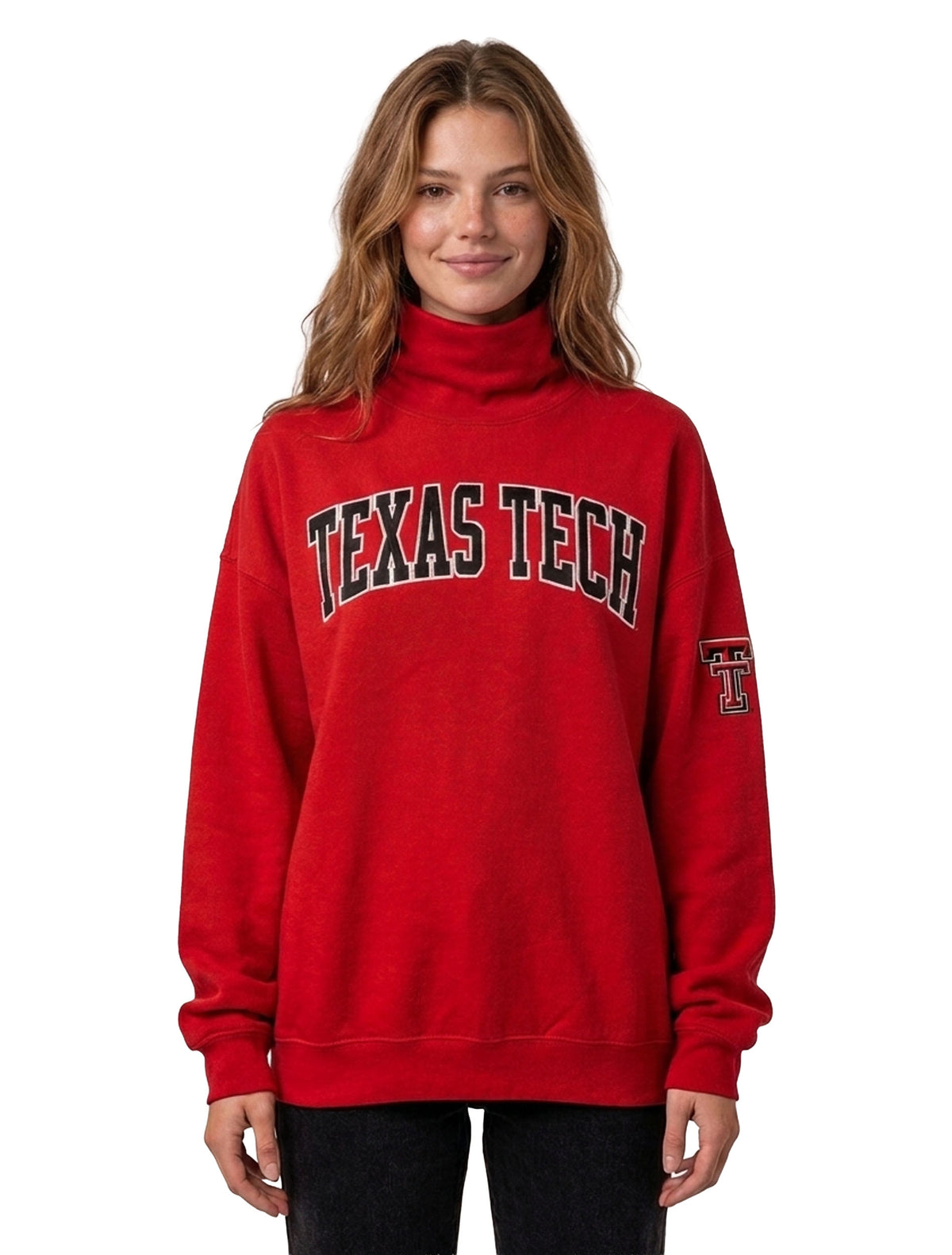 Model wearing a red turtleneck sweatshirt with TEXAS TECH embroidered in black arched across the chest and a throwback Double T on the left sleeve