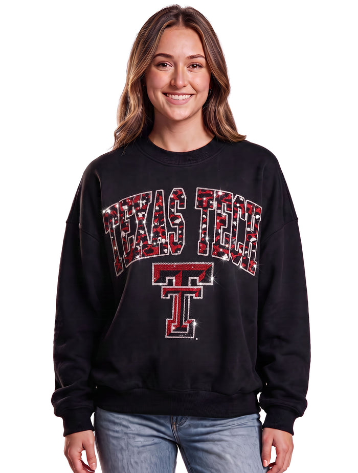Model wearing the black Texas Tech crewneck sweatshirt with a rhinestone red and black leopard print arch over a Double T