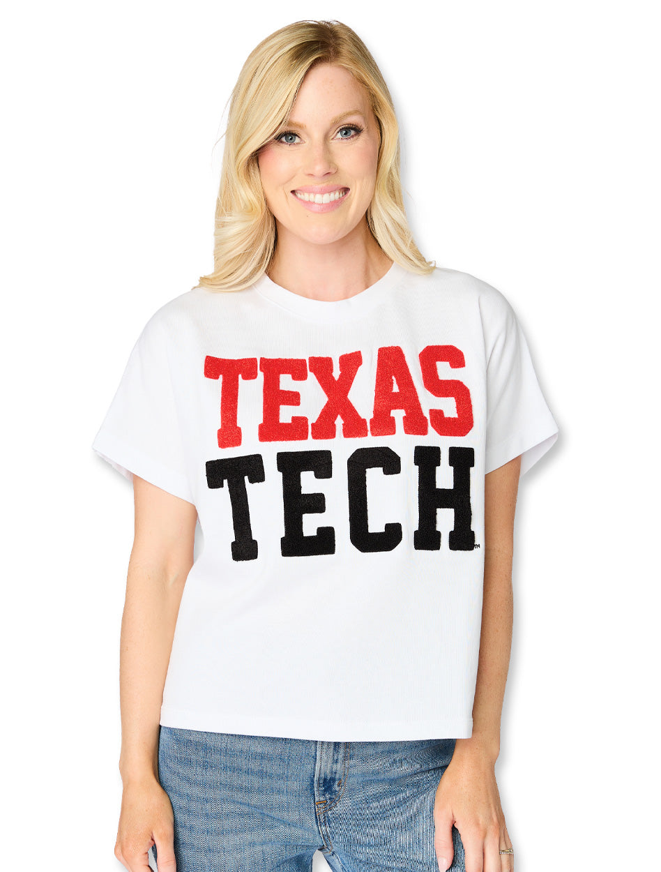 White Stewart Simmons Texas Tech boxy top with oversized chenille lettering, TEXAS in red above TECH in black