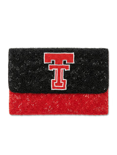 Two tone beaded Texas Tech clutch with a black beaded flap carrying a red and white vault Double T over a red beaded body
