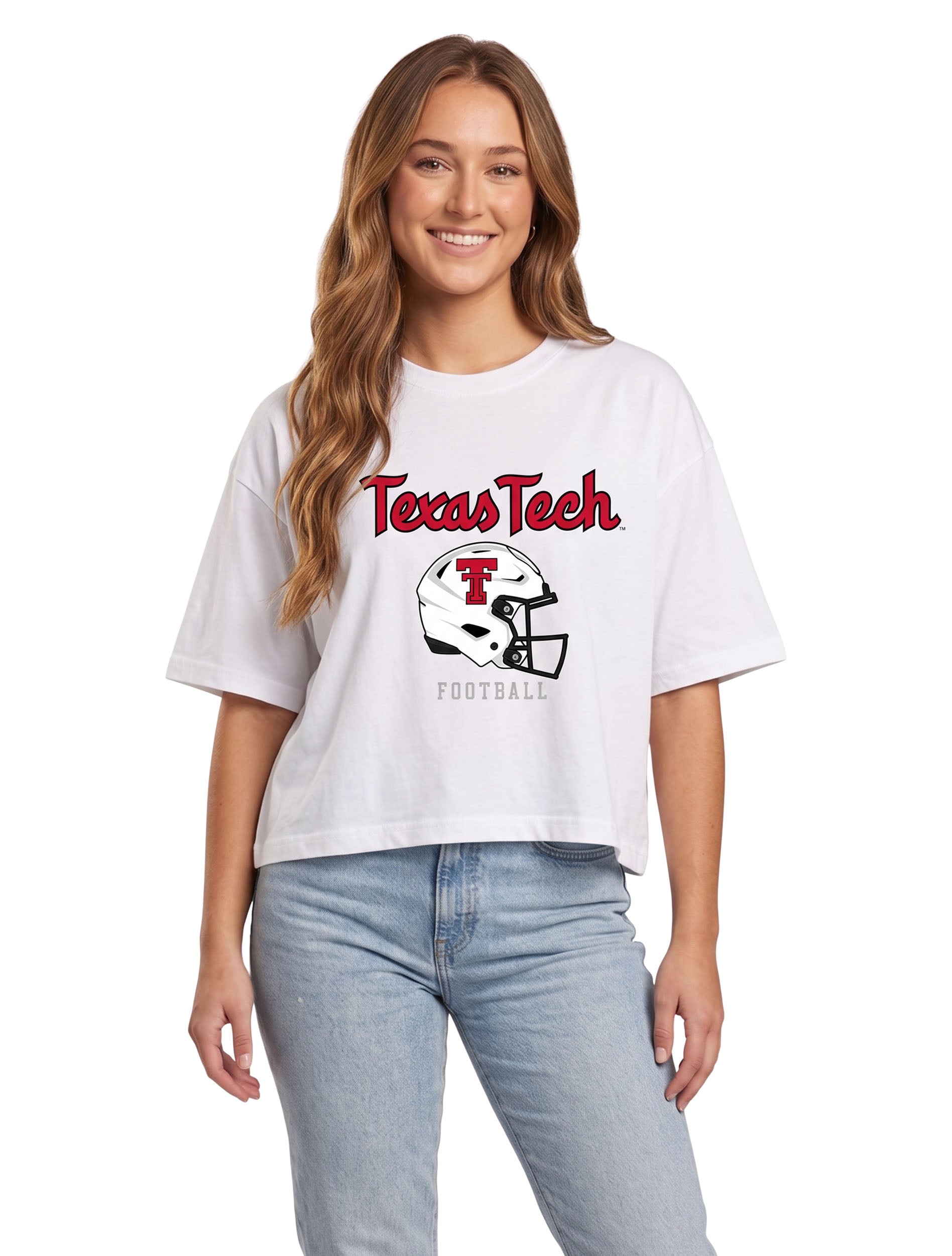 Model wearing a white crop tee with Texas Tech in red script above a white Double T football helmet and FOOTBALL in grey