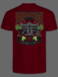 Back of the tee photographed in the dark, showing the Halloween design glowing green