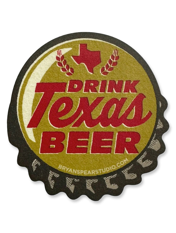 Bottle-cap shaped vinyl decal reading “Drink Texas Beer” with a Texas state outline, in gold, black, and red