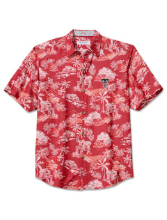 Red Tommy Bahama Texas Tech short sleeve button down with a white island print of palms, sailboats and thatched huts and an embroidered Double T at the left chest