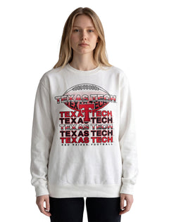 Model wearing the white Texas Tech crewneck sweatshirt with a football graphic and TEXAS TECH repeated over a red Double T